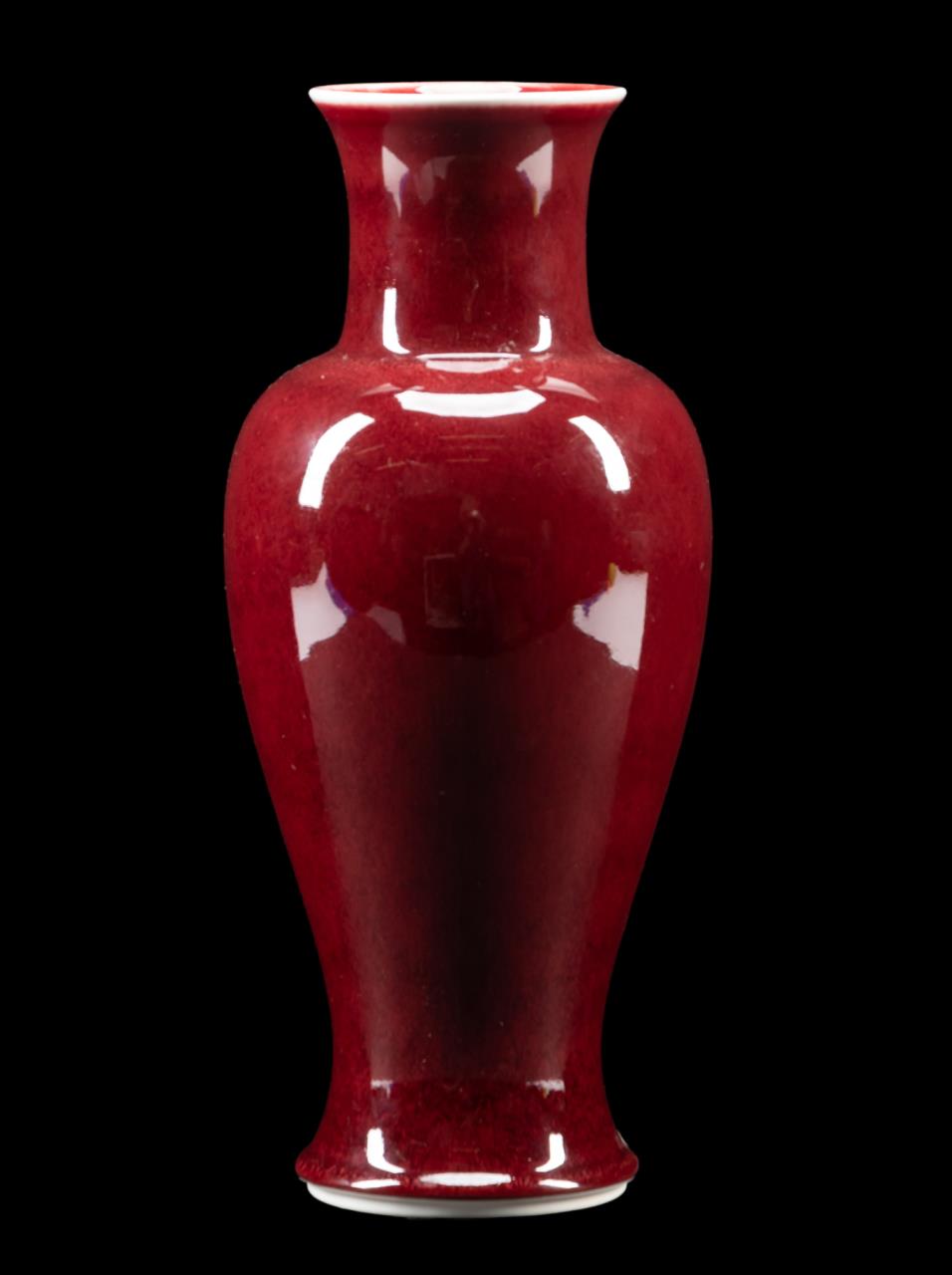 Appraisal: CHINESE PORCELAIN SANG DE BOEUF VASE Chinese oxblood glazed baluster