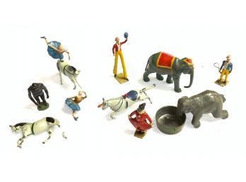 Appraisal: A partial set of signed Britains lead circus figures including