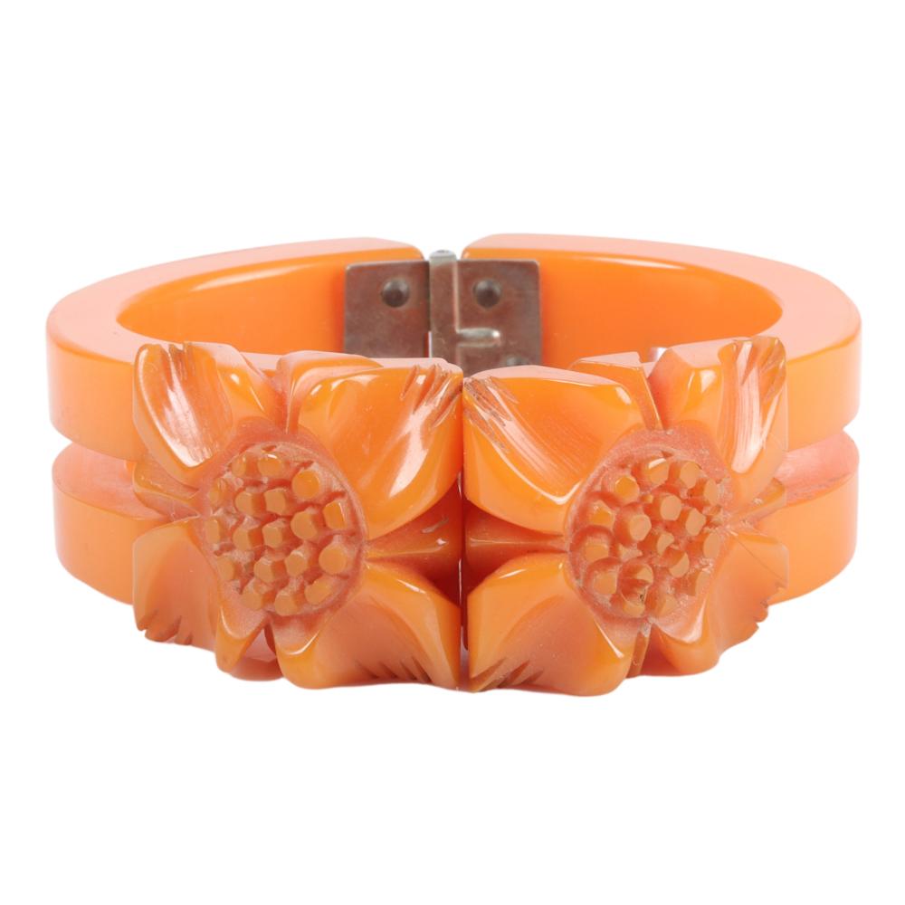 Appraisal: HINGED TANGERINE BAKELITE BRACELET CARVED FLORAL DESIGN H X INNER