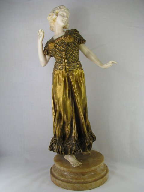 Appraisal: Fortunato Gori bronze and ivory sculpture of a woman on