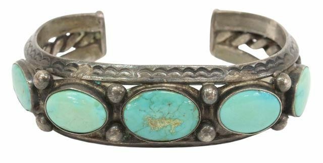 Appraisal: Native American silver content unknown cuff bracelet with five oval