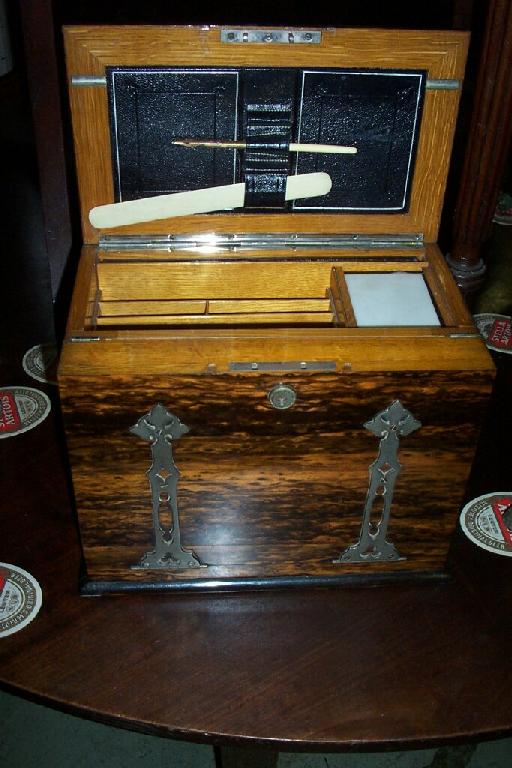 Appraisal: A Victorian coromandel wood writing box with comprehensively fitted interior