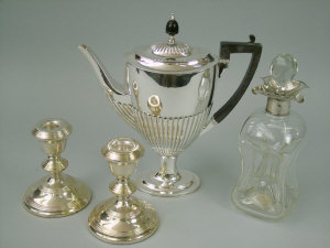 Appraisal: An Edwardian silver coffee pot London marks rubbed together with