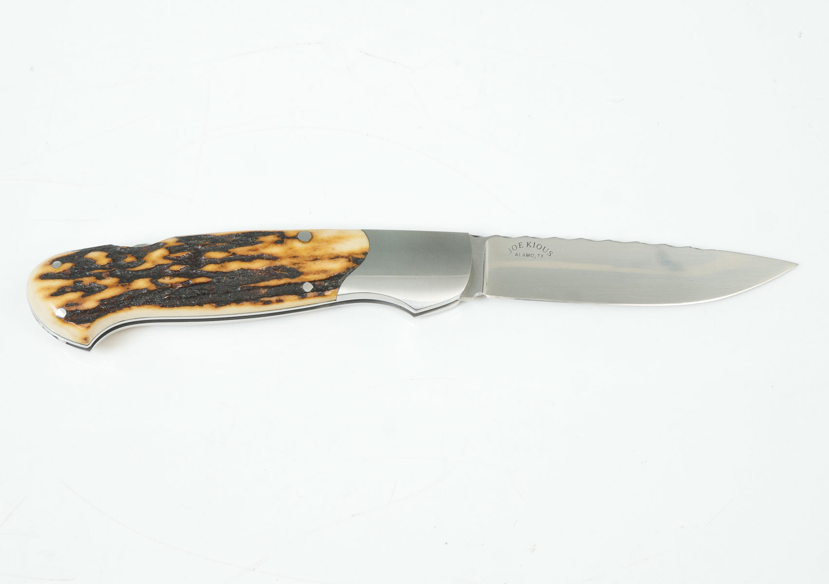 Appraisal: JOE KIOUS FOLDER ANTLER HANDLE Stainless steel frame with beautiful