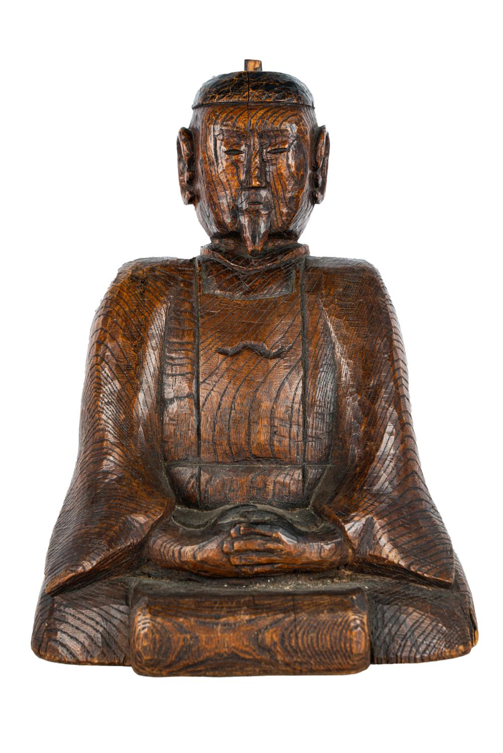 Appraisal: SEATED WOOD BUDDHACondition with areas of wood separation and general