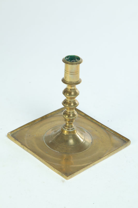 Appraisal: BRASS CANDLESTICK Probably Spain late th-early th century Knop stem