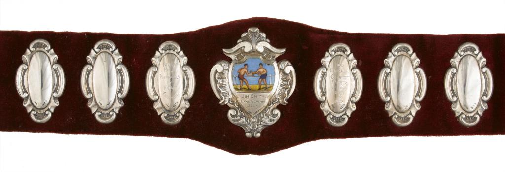 Appraisal: A GEORGE V BOXER'S BELT of maroon velvet applied with