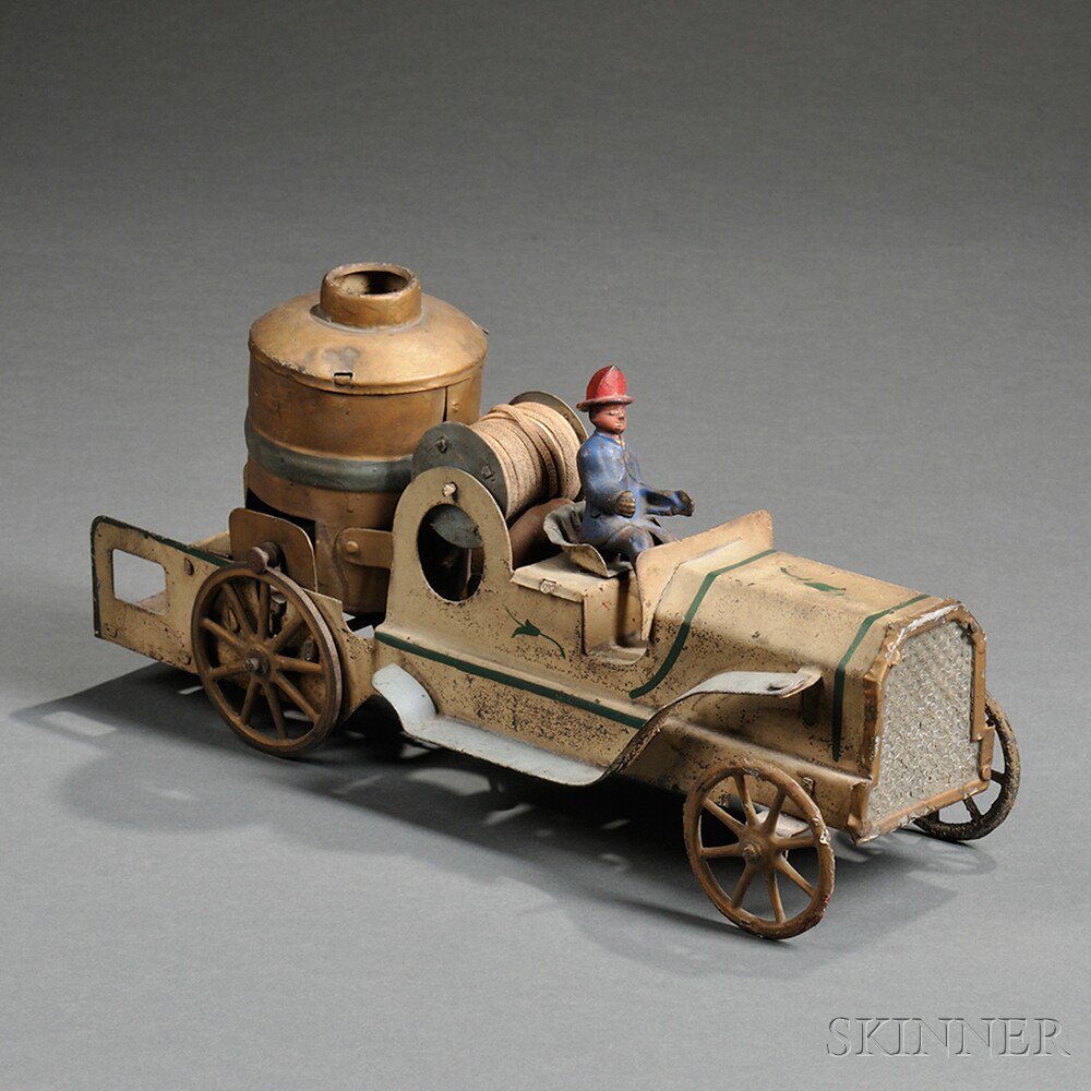 Appraisal: Painted Sheet and Cast Iron Hill Climber Fire Pumper Toy