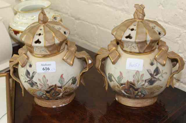 Appraisal: A PAIR OF IVORY GROUND POT POURRI VASES with RH