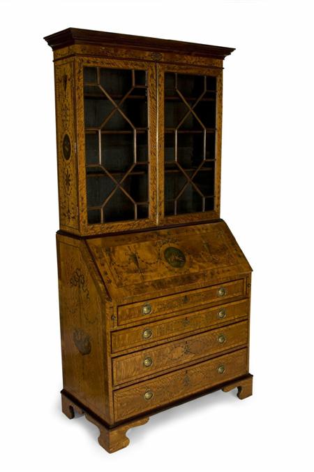 Appraisal: A Sheraton Revival painted satinwood bureau bookcase the dentil cornice