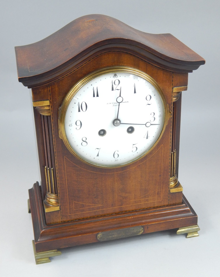 Appraisal: An early thC mahogany boxwood strung and checker banded mantel