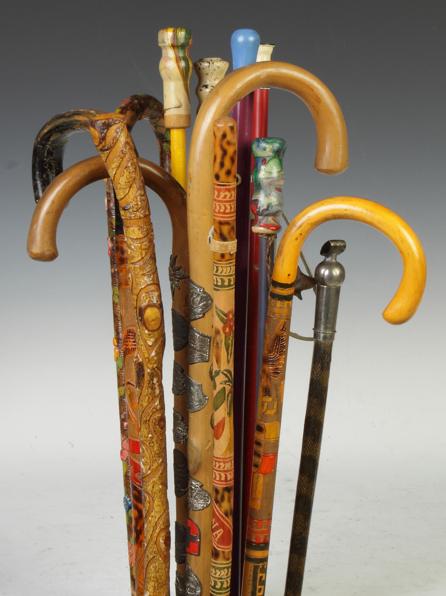 Appraisal: Group of Various Souvenir Canes Carved painted