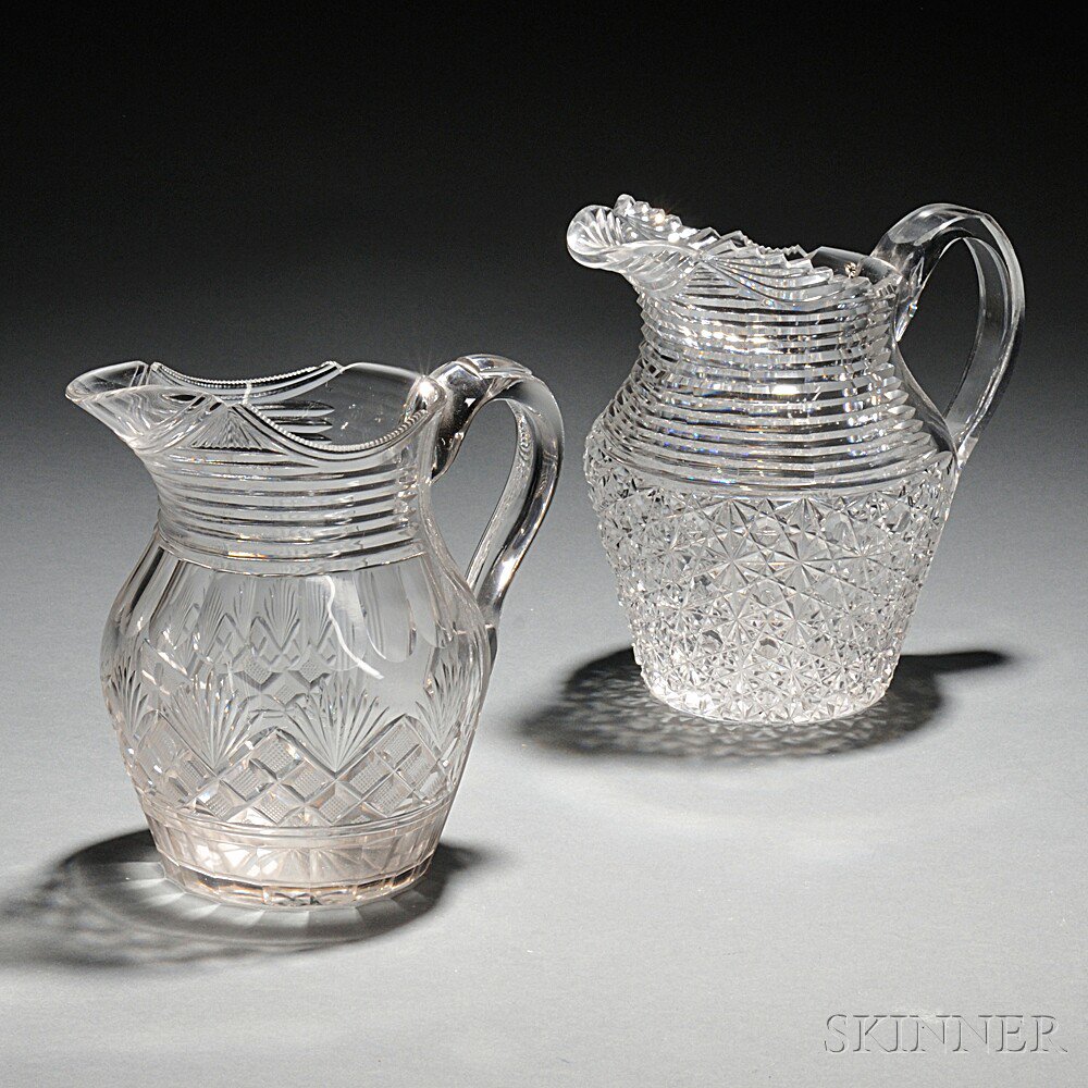 Appraisal: Two Colorless Cut Glass Pitchers late th early th century