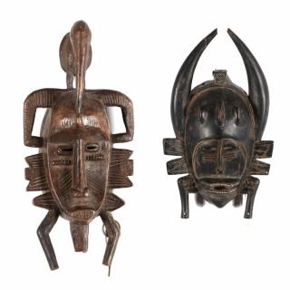 Appraisal: Ivory Coast Two Senufo Kpelie Masks carved wood the brown