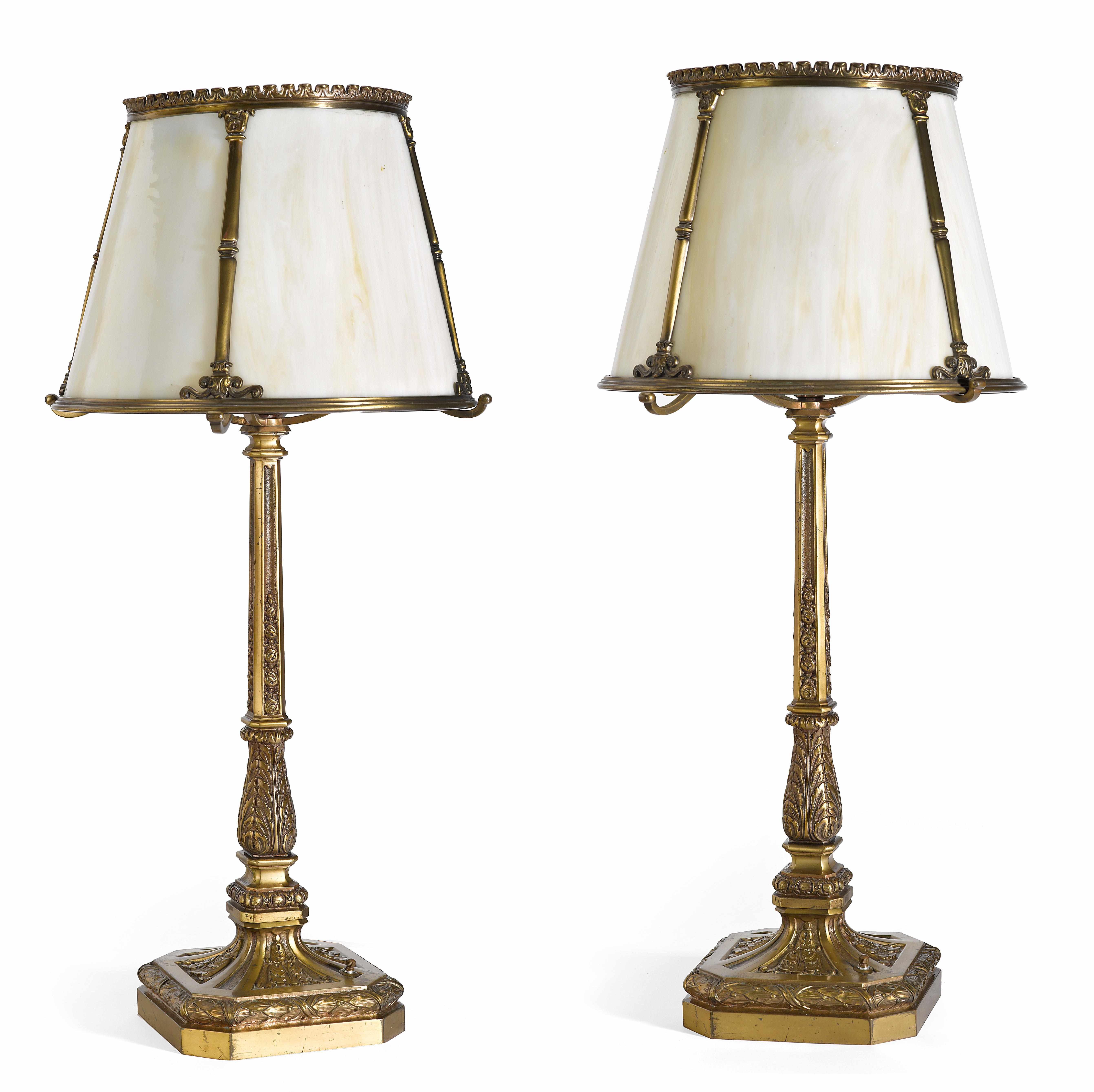 Appraisal: A pair of Neoclassical style bronze slag glass table lamps