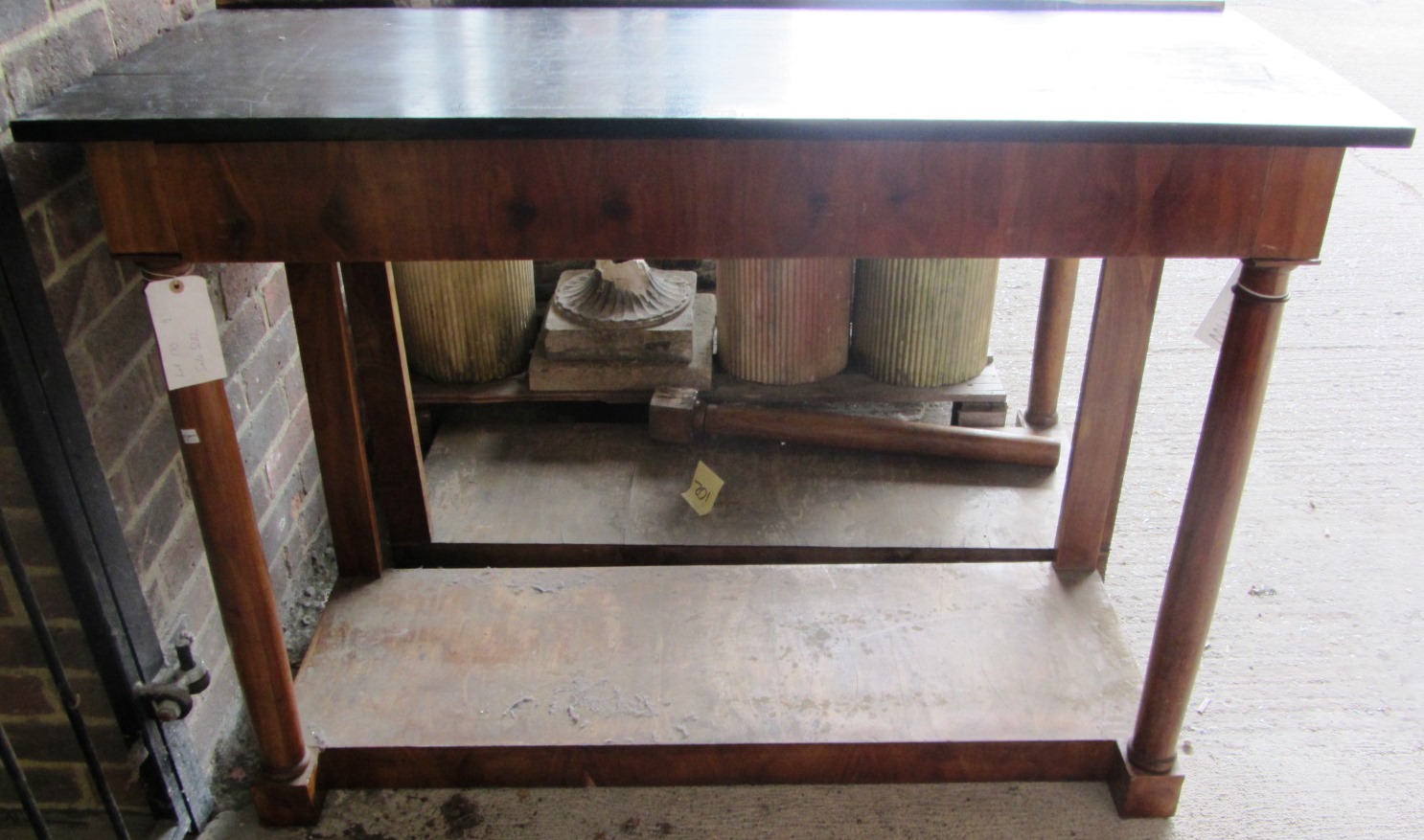 Appraisal: A pair of th century fruitwood rectangular console tables on