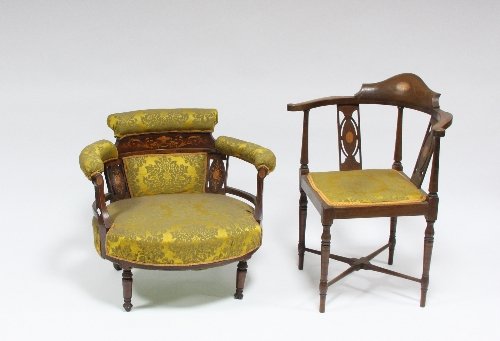 Appraisal: An Edwardian corner armchair with inlaid cresting rail and twin