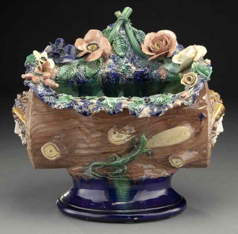 Appraisal: Francois Maurice majolica jardiniere the body formed by a log