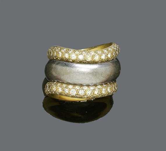 Appraisal: GOLD RING POMELLATO WITH DIAMOND RINGS White and yellow gold