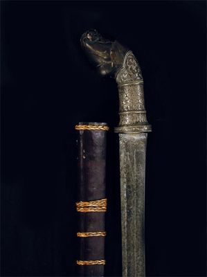 Appraisal: A Malayan sword with European blade and silver mounted carved