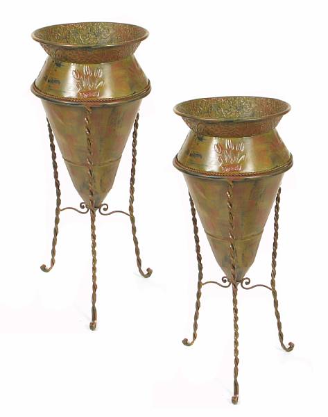 Appraisal: A pair of cone shaped tole urns on stands height