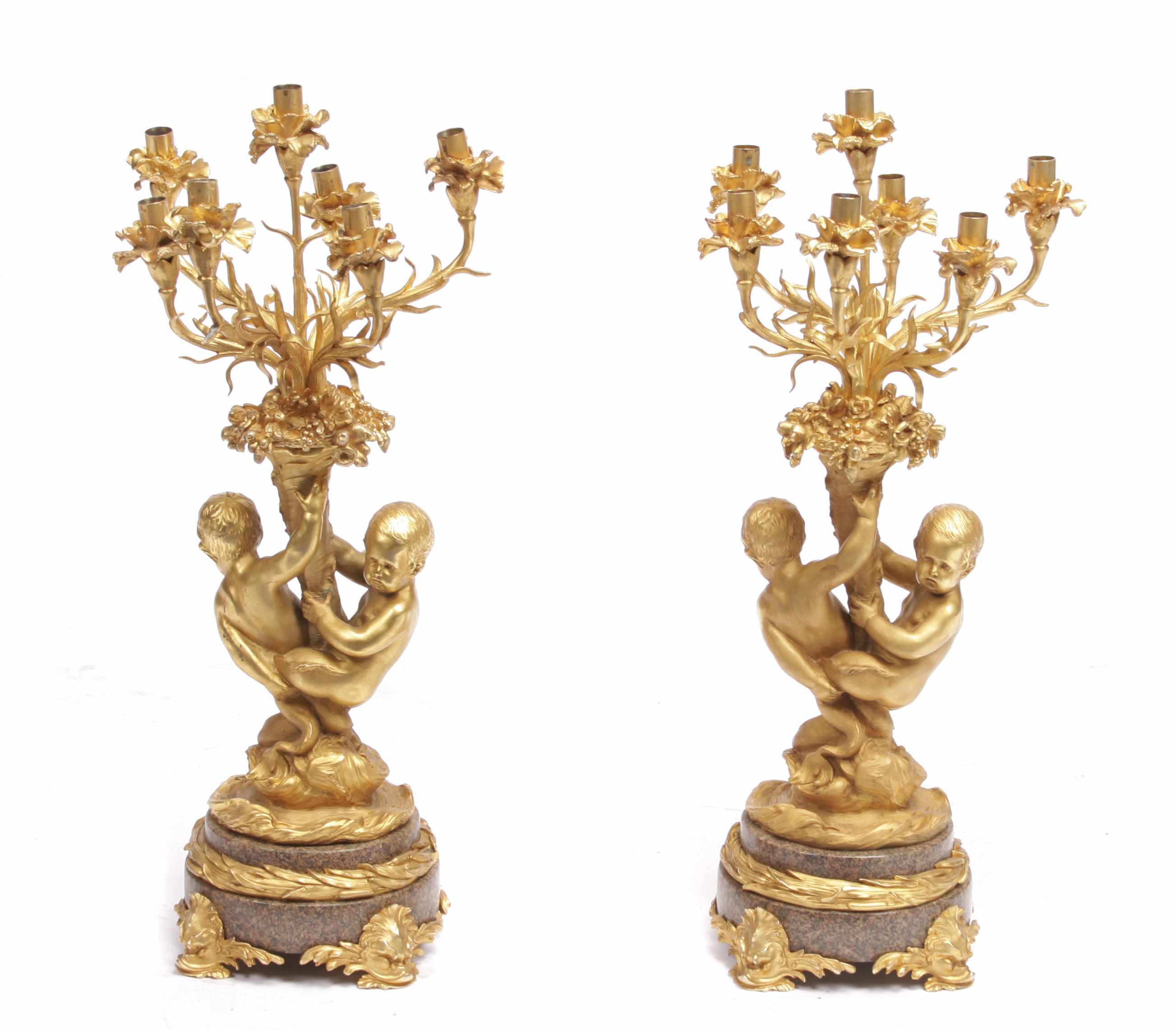 Appraisal: A pair of Louis XV style gilt bronze and marble