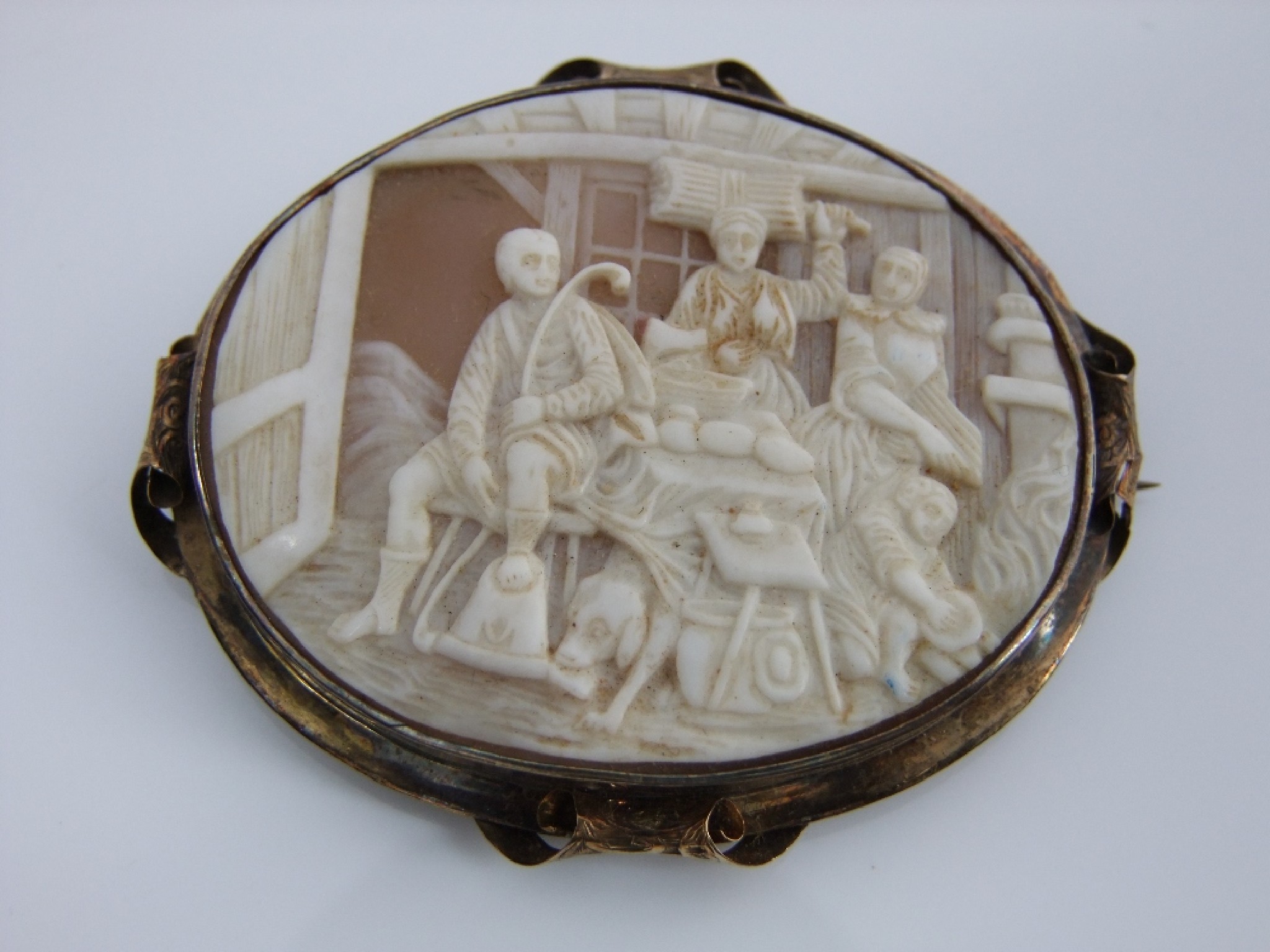 Appraisal: A th century cameo brooch the oval panel unusually showing