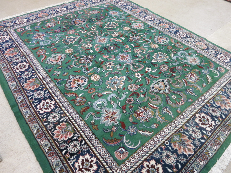 Appraisal: HAND KNOTTED ORIENTAL CARPET Indo-Persian featuring an overall floral decorated