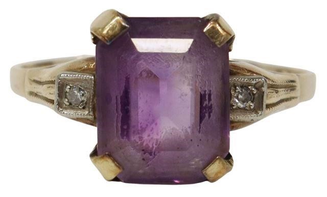 Appraisal: Estate kt yellow gold ring octagon-cut amethyst framed by two