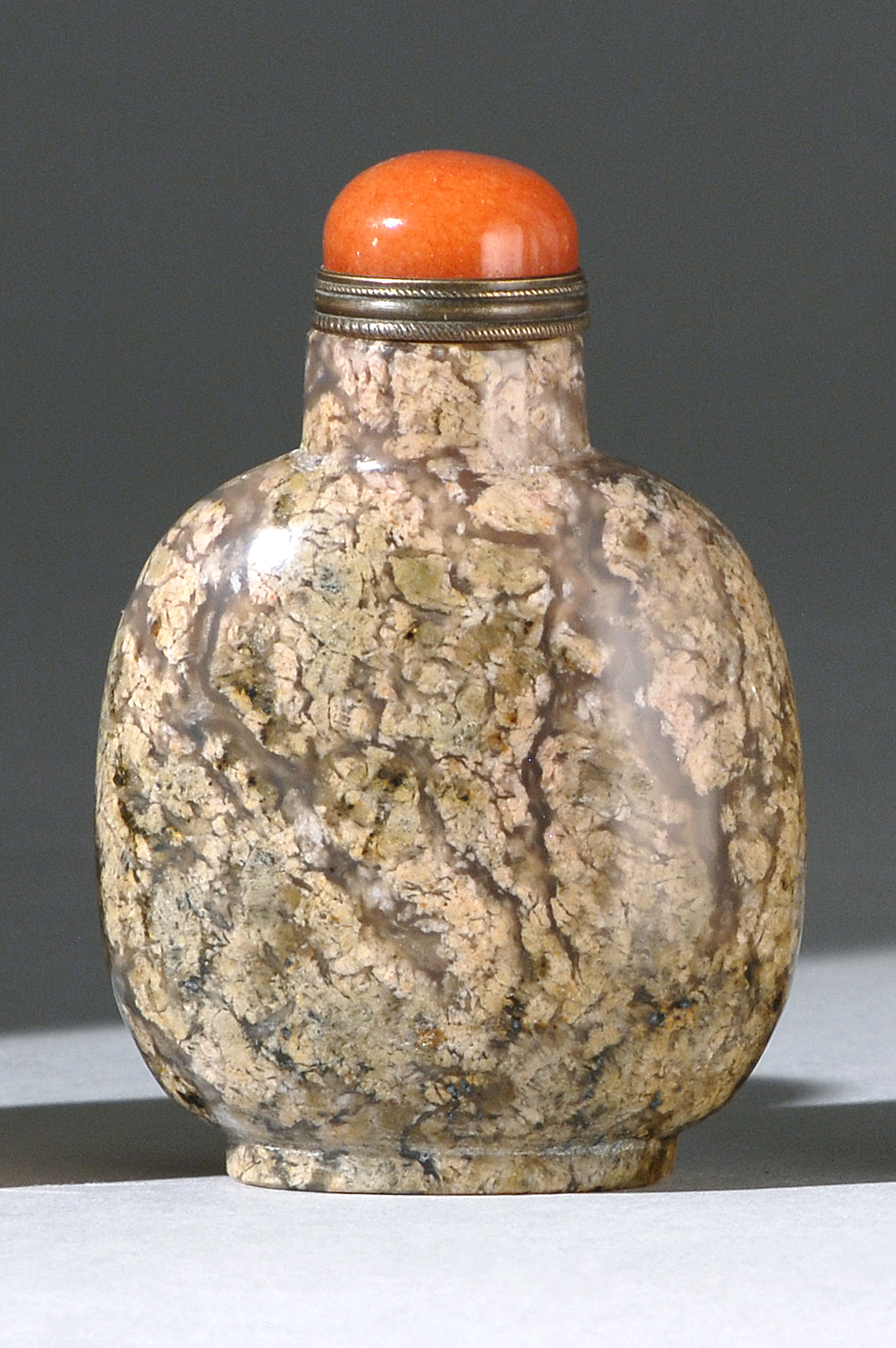 Appraisal: MOSS AGATE SNUFF BOTTLE th CenturyIn ovoid form with brown