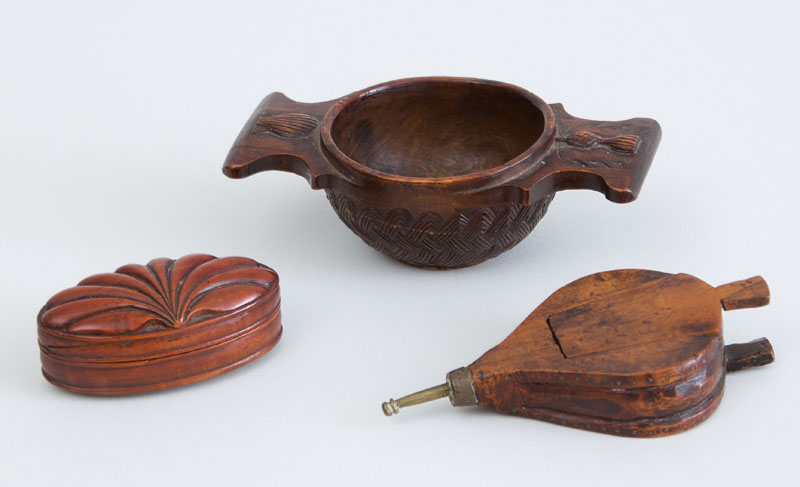 Appraisal: THREE EUROPEAN SMALL CARVED WOOD ARTICLES Comprising a Scottish cup