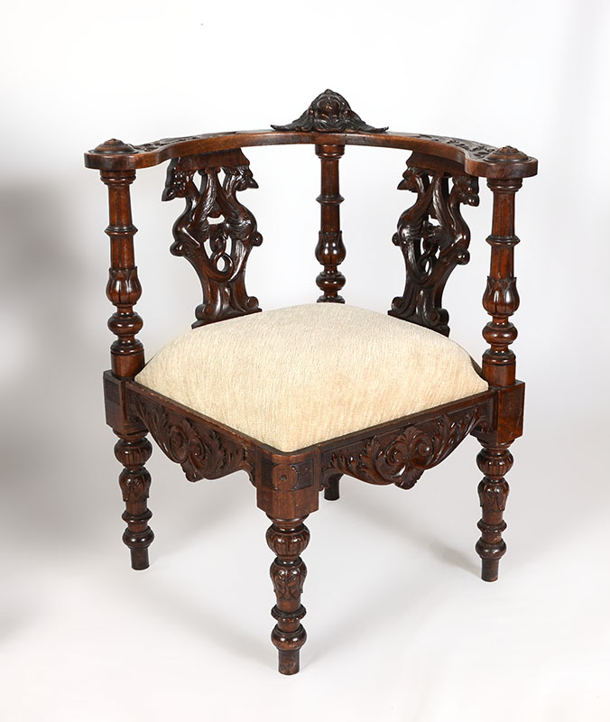 Appraisal: CARVED RENAISSANCE REVIVAL CORNER CHAIR Carved in the Italian Renaissance