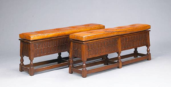 Appraisal: A pair of Baroque style walnut oak and leather benches