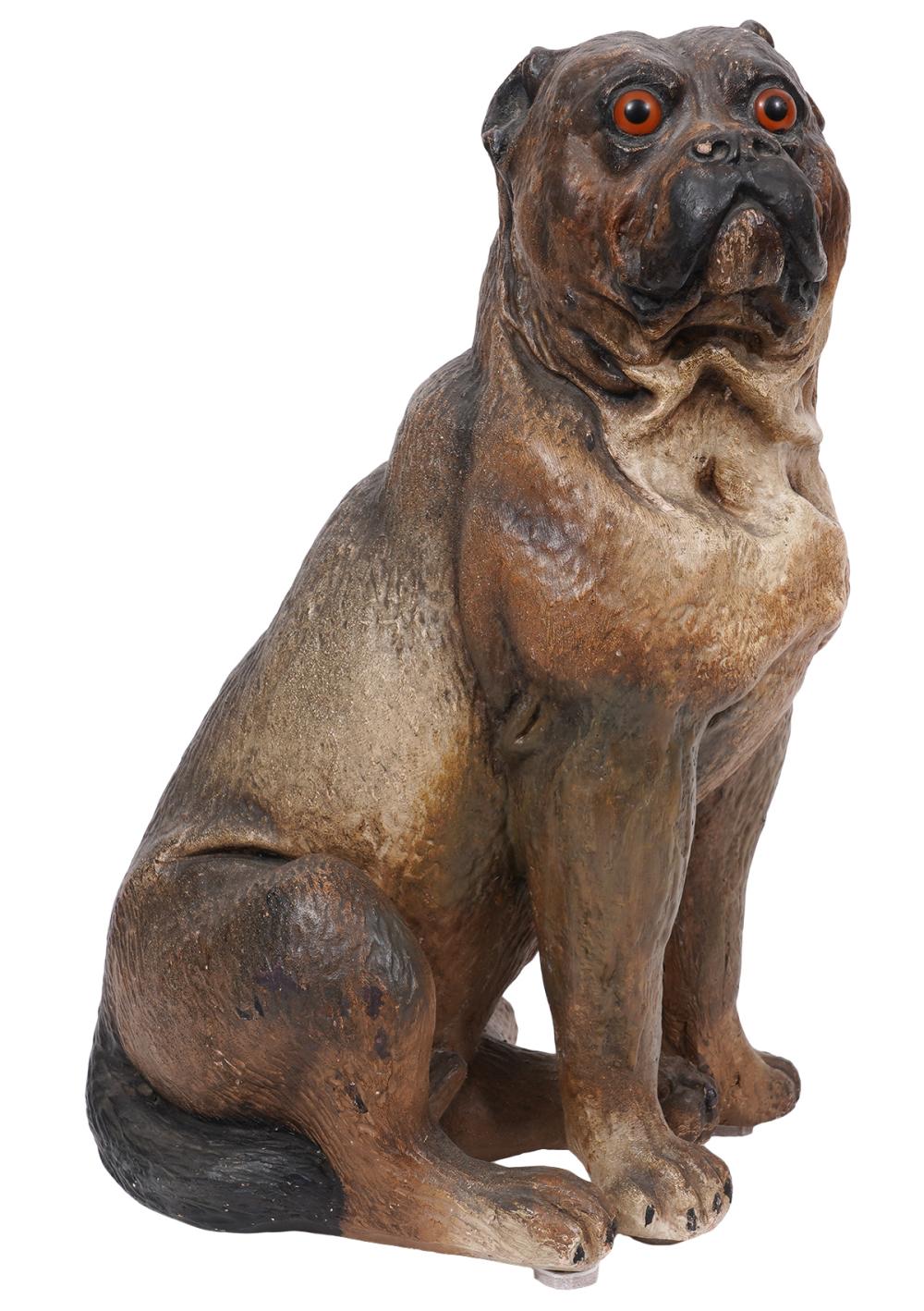 Appraisal: TERRACOTTA SITTING PUG STATUETerracotta sitting pug statue has a glazed