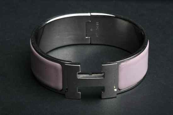 Appraisal: HERM S PINK ENAMELLED SILVER AND PALLADIUM PLATED CLIC-CLAC H