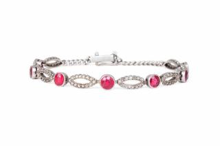 Appraisal: A Platinum Ruby and Diamond Bracelet A Platinum Ruby and