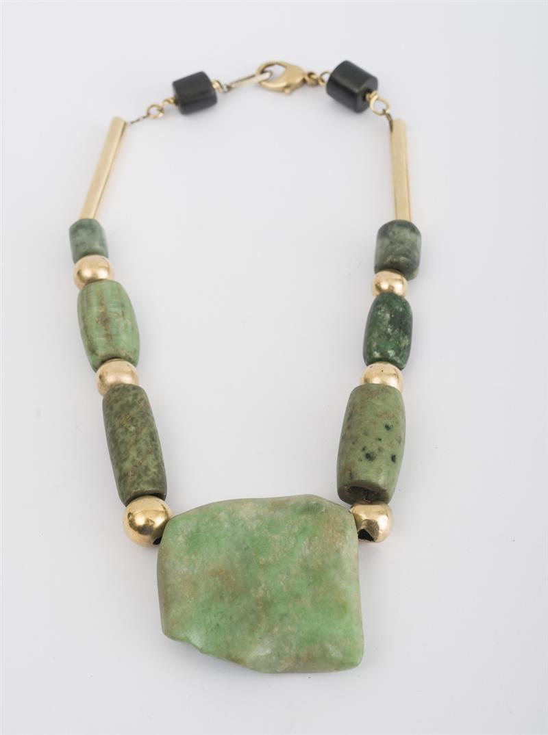 Appraisal: Three Primitive Stone Bead Necklaces With gold-filled beads in in