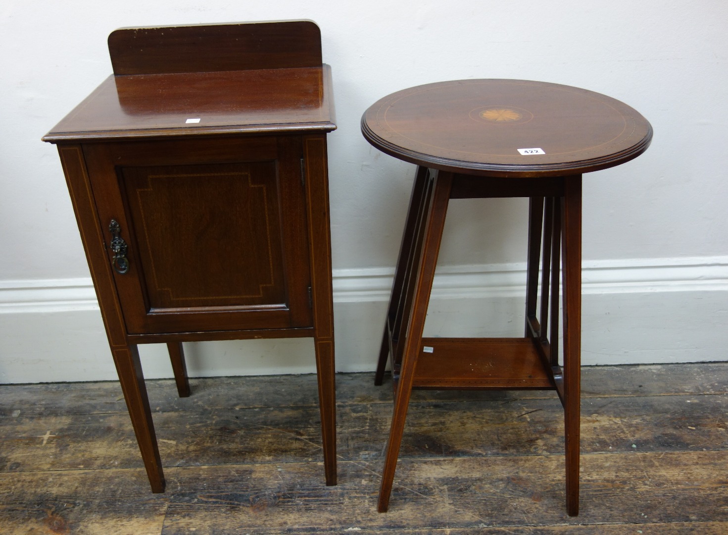 Appraisal: An Edwardian mahogany boxwood and ebony strung two tier occasional