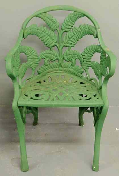 Appraisal: Victorian green painted cast iron bench in a fern design