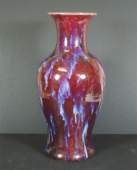 Appraisal: A Chinese red and plum glazed vase of baluster form