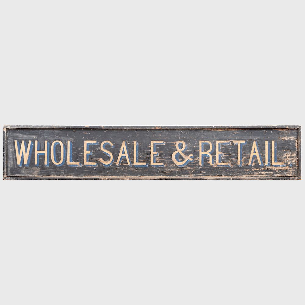 Appraisal: Painted Wood 'Wholesale Retail' Trade Sign With two metal eye