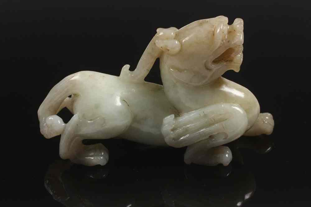 Appraisal: CHINESE JADE FIGURINE - Chinese Jade Carving of a Reclining