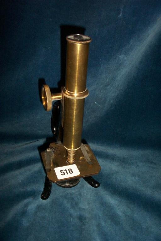 Appraisal: A late th century brass microscope of adjustable form by