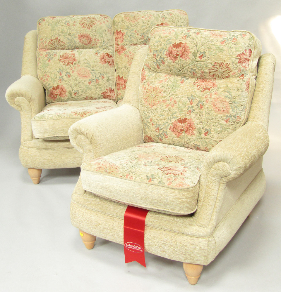 Appraisal: An Aubrey Paul two seater sofa and single armchair with