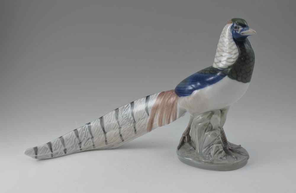 Appraisal: ROYAL COPENHAGEN PHEASANT Under glaze Royal Copenhagen marks and original