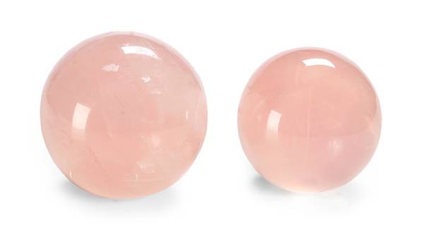 Appraisal: Natural History and Gemstones Two rose quartz spheres one featuring