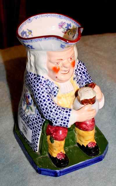 Appraisal: A COPELAND LATE SPODE TOBY JUG the seated and grimacing