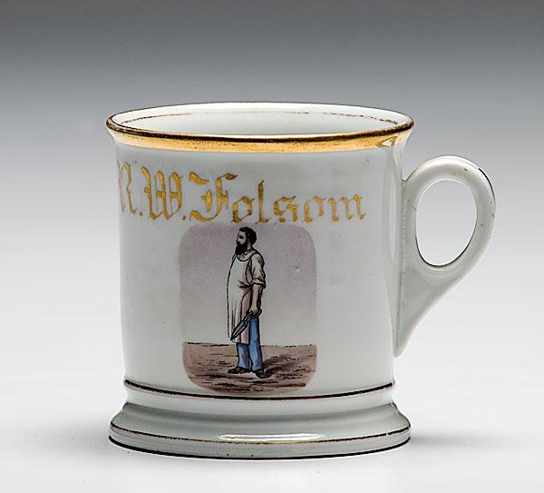 Appraisal: TINSMITH'S OCCUPATIONAL SHAVING MUG porcelain with polychrome painted scene of