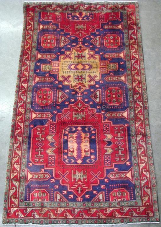 Appraisal: Handmade Oriental Area Rug Serapi design navy blue field with