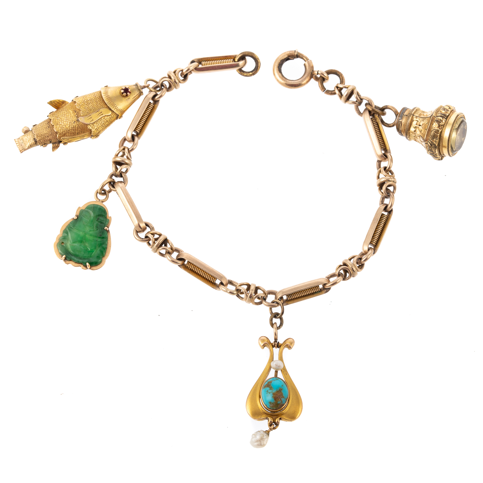 Appraisal: A VINTAGE ECLECTIC CHARM BRACELET IN GOLD K yellow gold